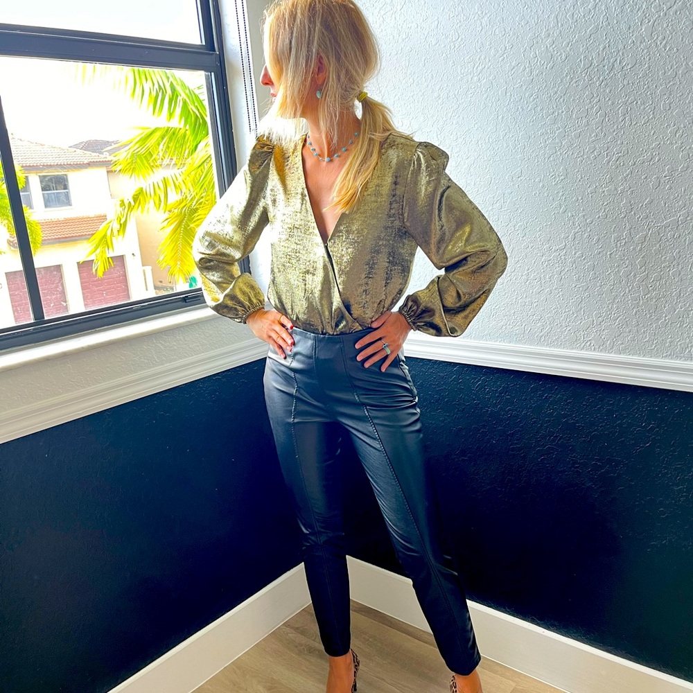 Black leather pants with sexy gold  blouse